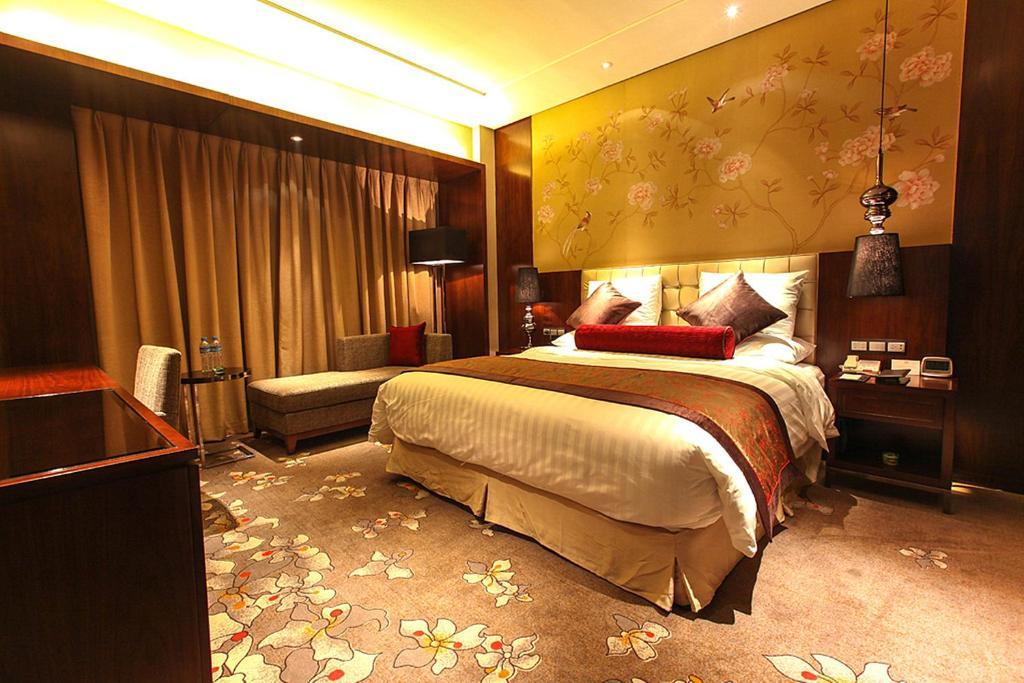 Jitang Kaiyuan New Century Hotel Tangshan Quarto foto
